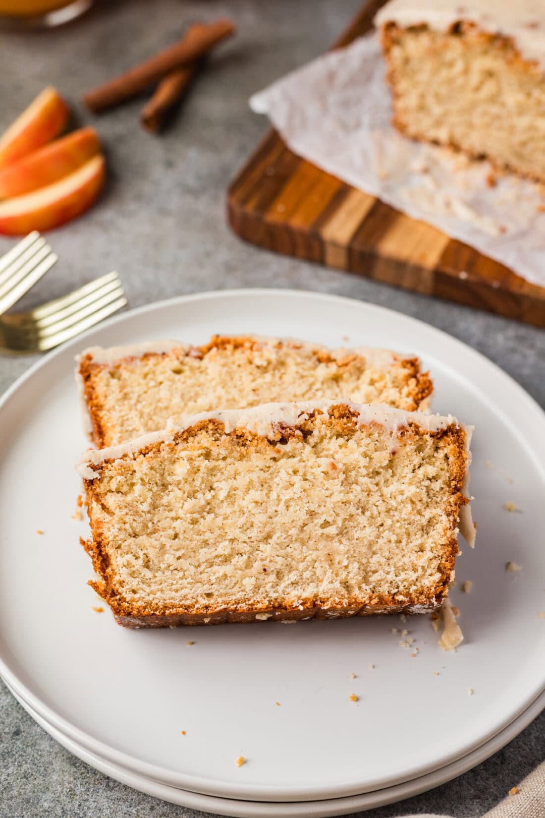 Two slices of Apple Cider Pound Cake on a plate