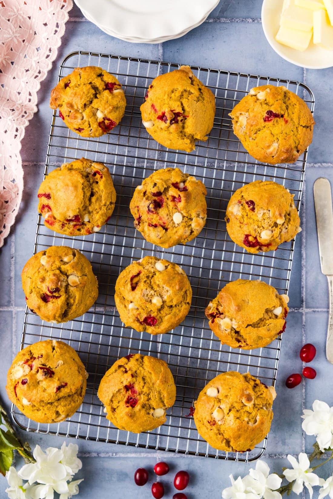 Pumpkin Cranberry Muffins resting on a wire rack