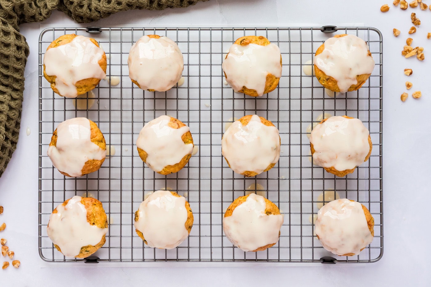 sour cream glaze on top of zucchini muffins