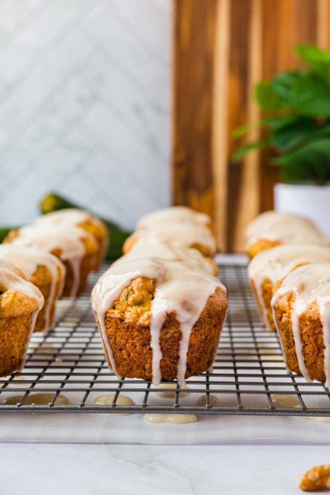 Shortcut Zucchini Muffins on a wire rack