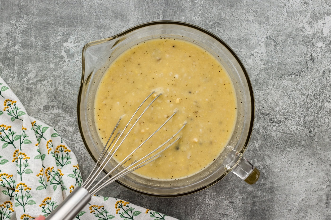 tuna casserole sauce ingredients whisked in a mixing bowl