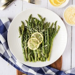 Plate of Instant Pot Asparagus with lemon slices