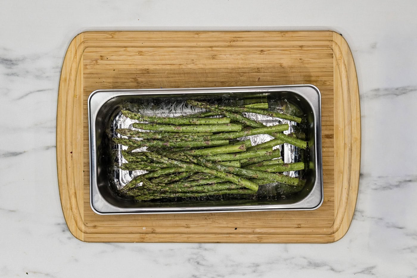 butter coated asparagus seasoned with garlic salt and black pepper