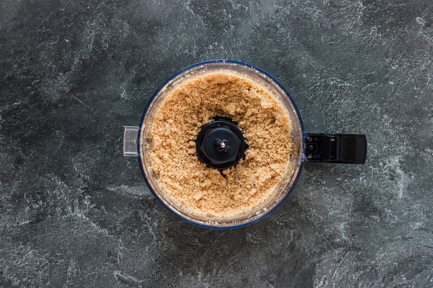 crushed Oreo cookies in a food processor