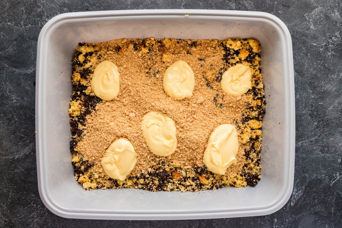 pudding added on top of crushed Oreos and cake