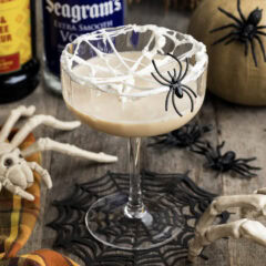 Spiderweb Cocktail with a fake spider on the glass