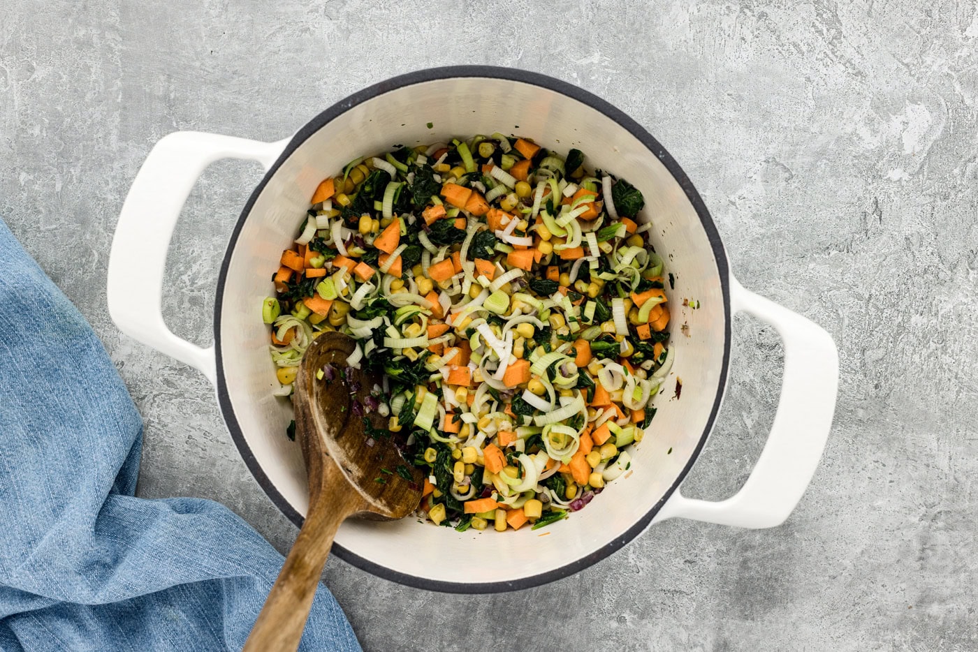 vegetables mixed in a pot with a spoon