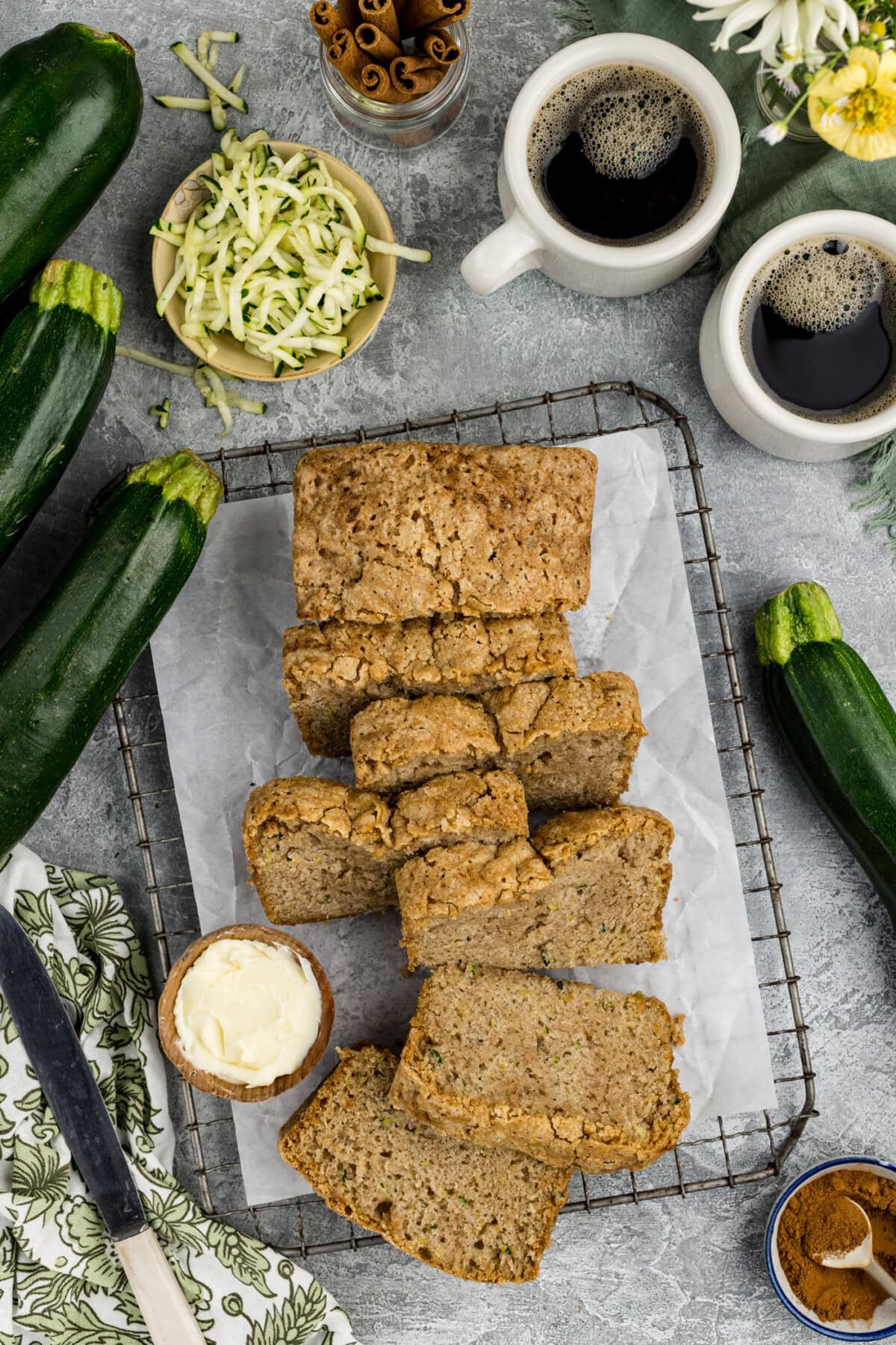 Overhead photo of a loaf of Zucchini Bread cut into slices