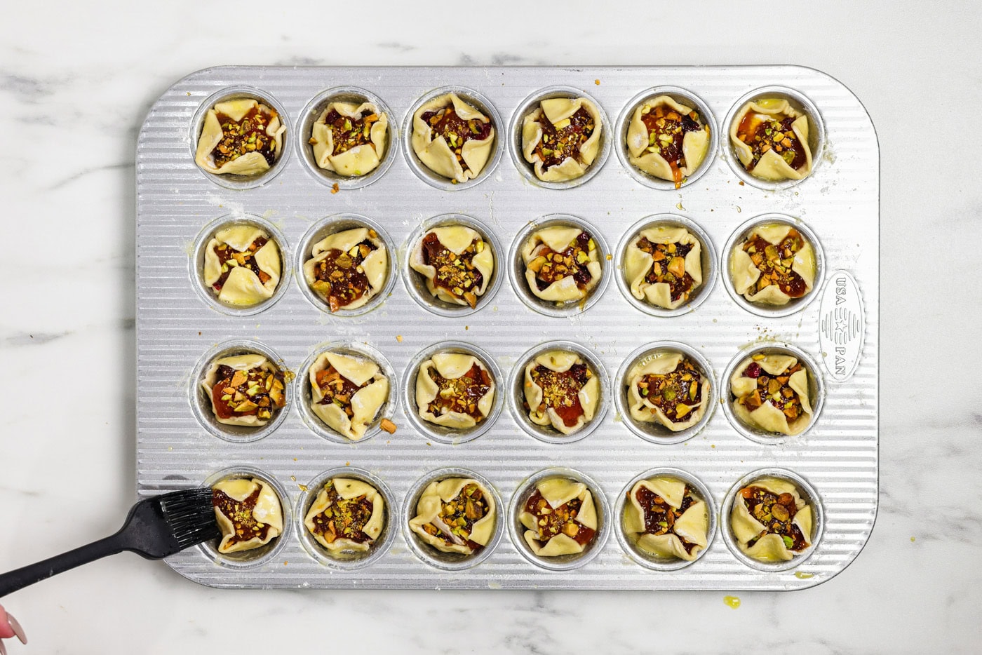 overhead of brie bites before being baked