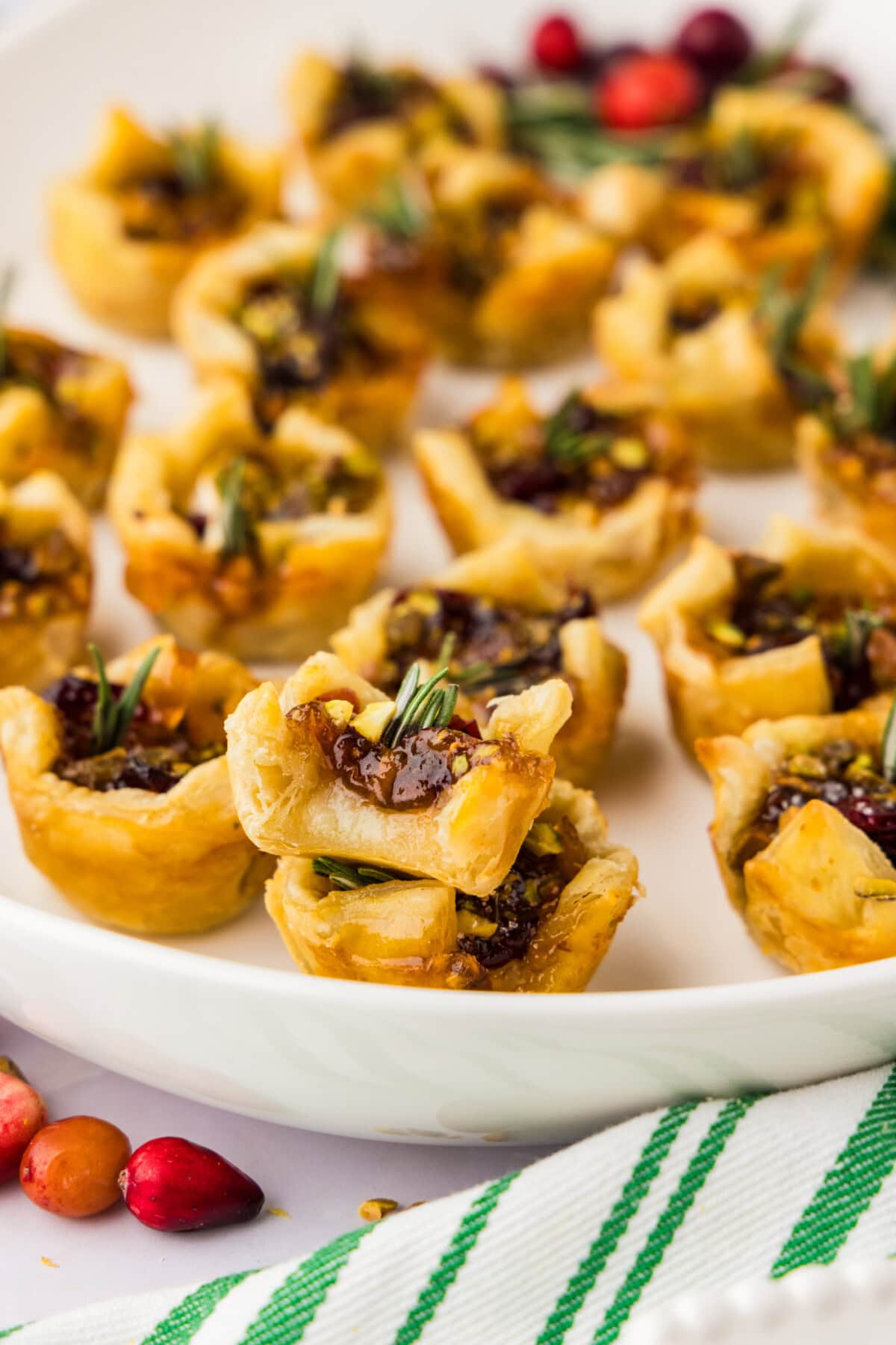 Pile of Brie Bites on a white plate