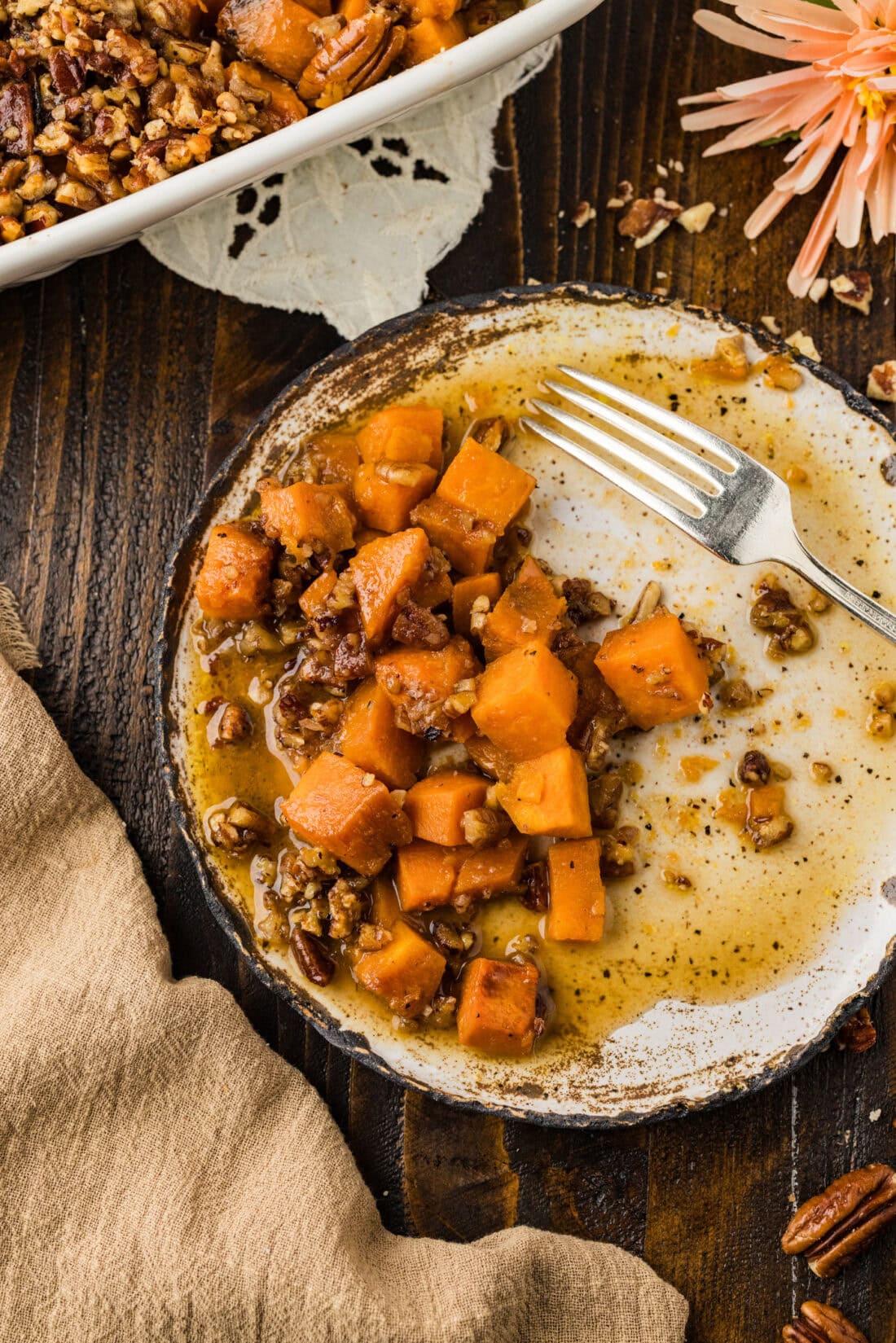 Kentucky Bourbon Sweet Potatoes on a plate with a fork