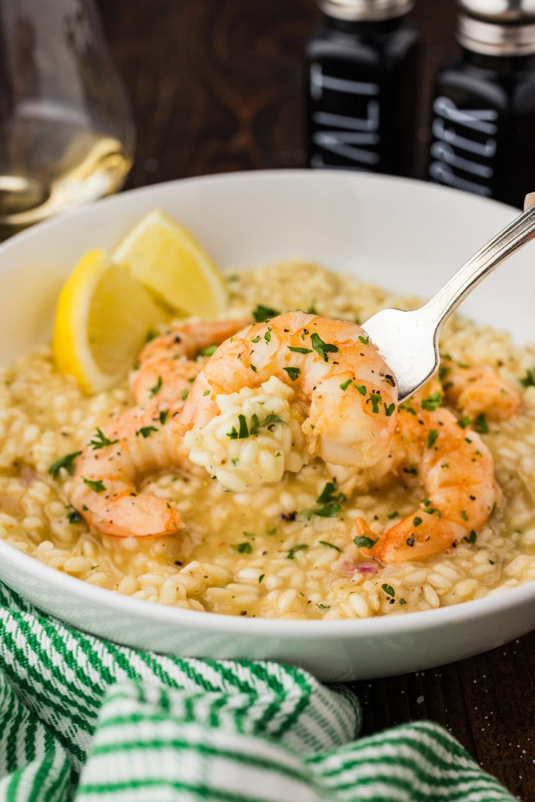 Forkful of Shrimp Risotto being lifted from the bowl of Shrimp Risotto