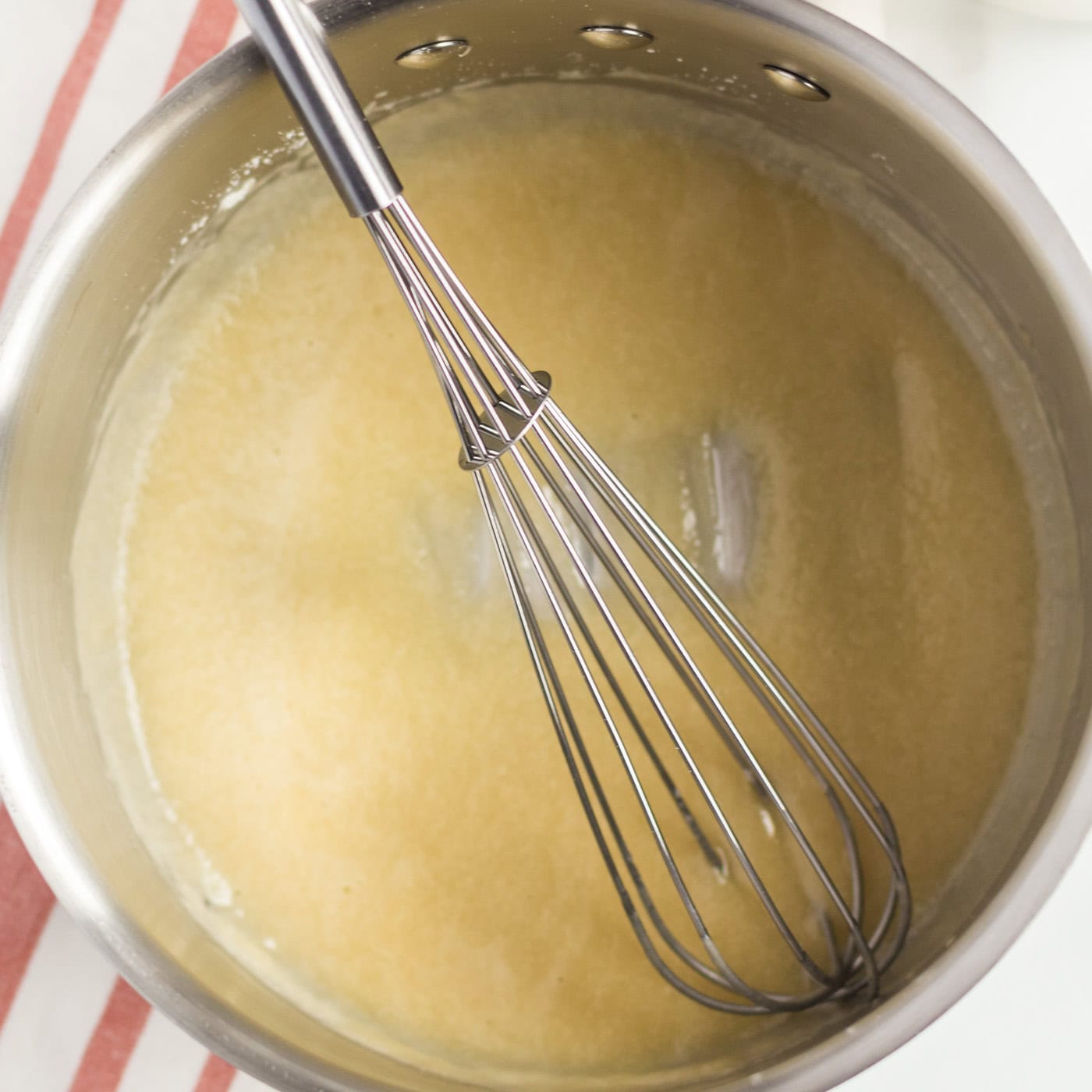 Whisk in a saucepan of butter and flour