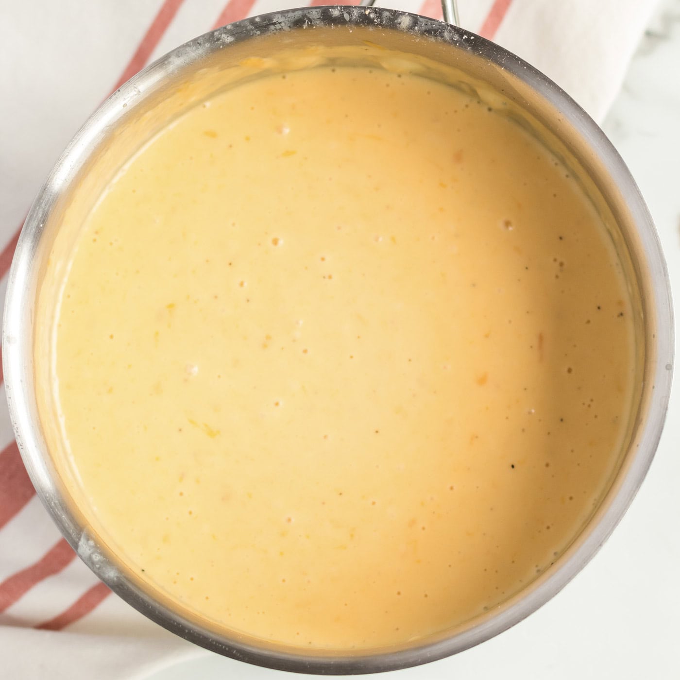 Saucepan of cheese sauce