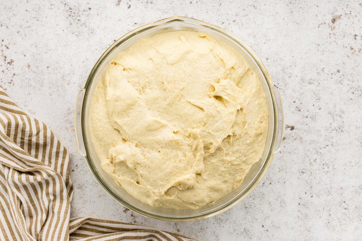 risen dough in a bowl