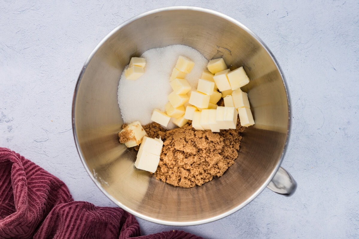 butter cubes, brown sugar, and granulated sugar in a mixing bowl