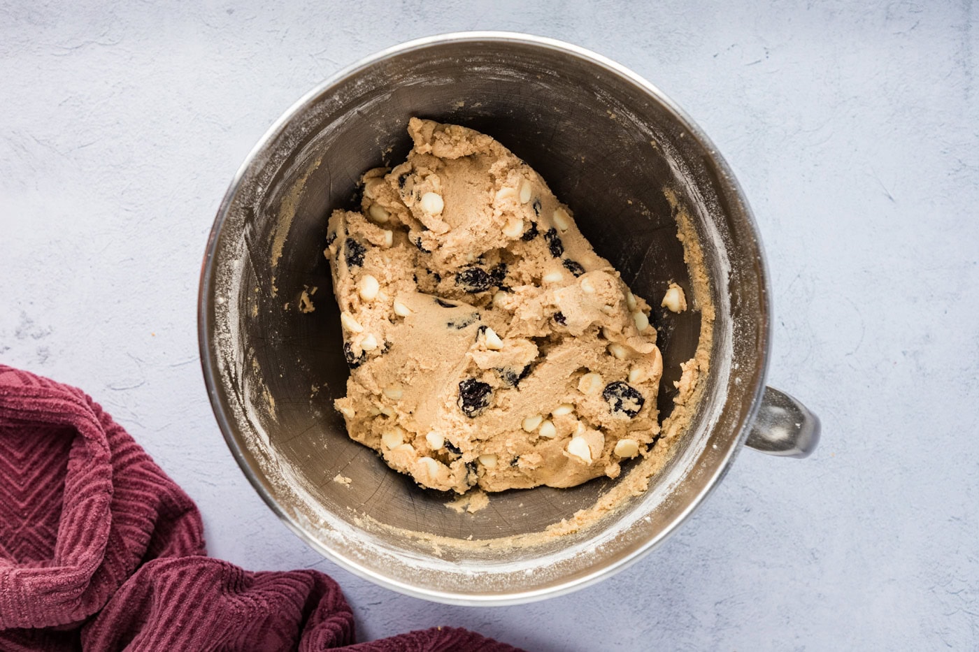 cherry white chocolate chip cookie dough in a stand mixer bowl