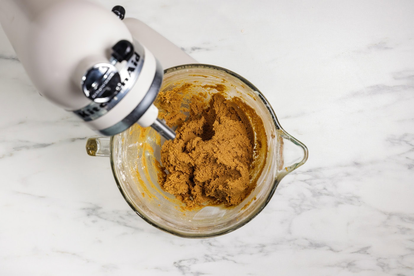 gingersnap cookie dough in a stand mixer bowl
