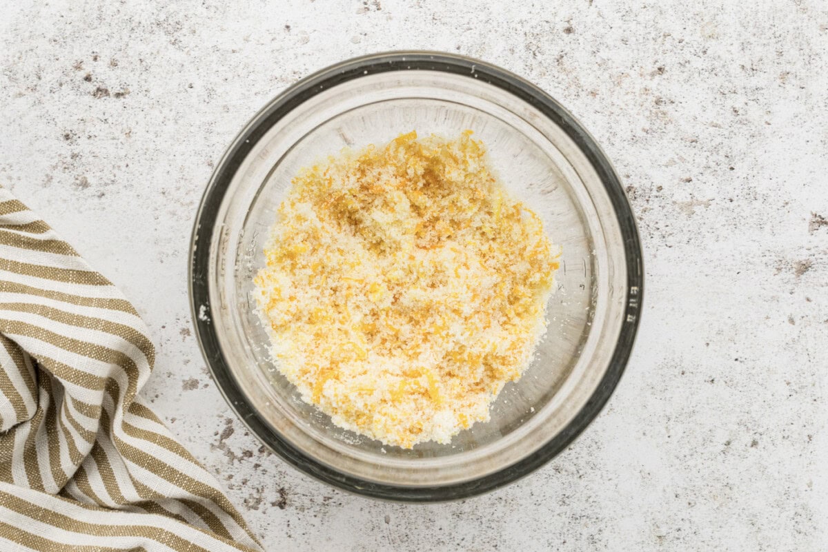 orange zest and sugar mixed in a bowl