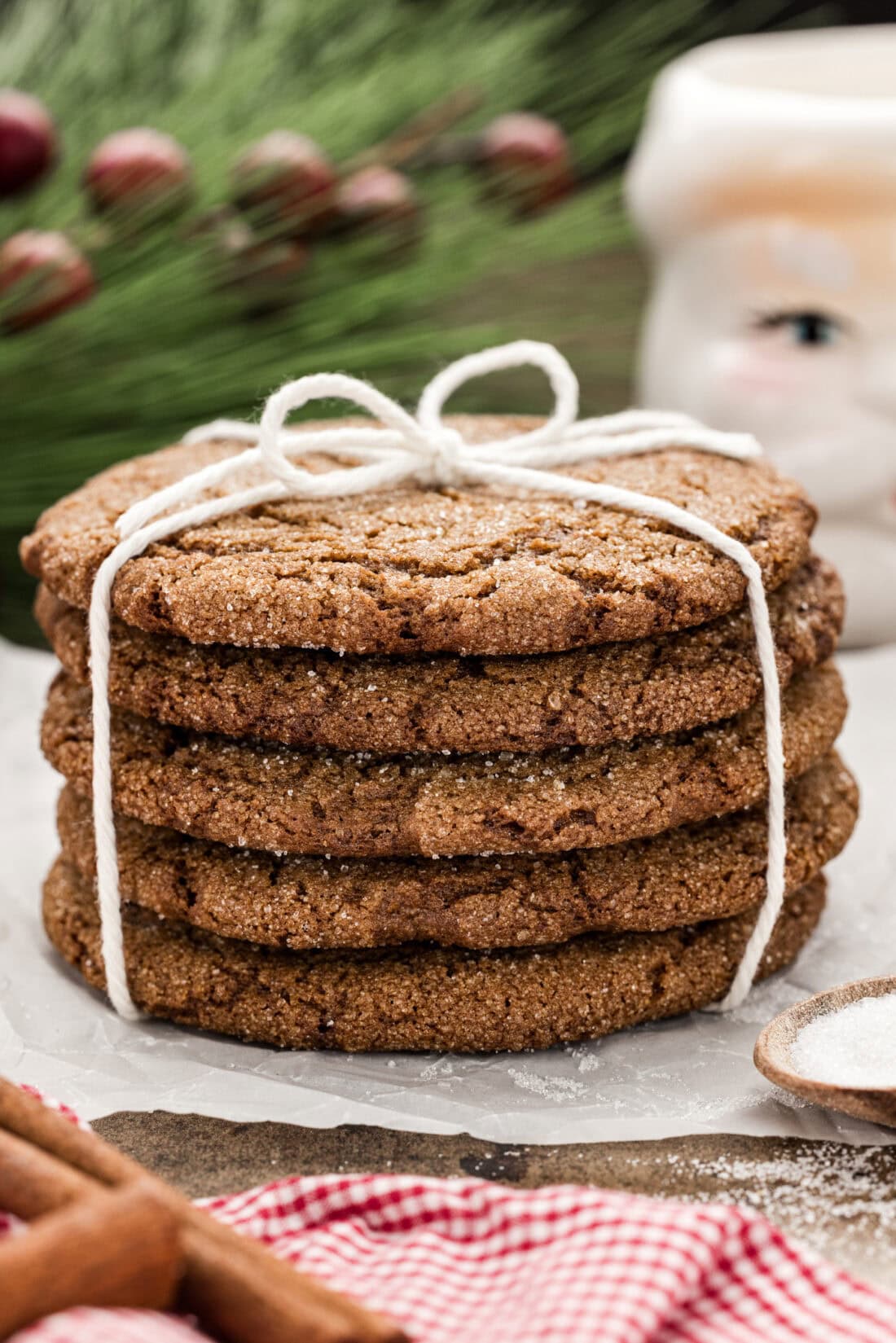 Stack of Molasses Spice Cookies wrapped in twine