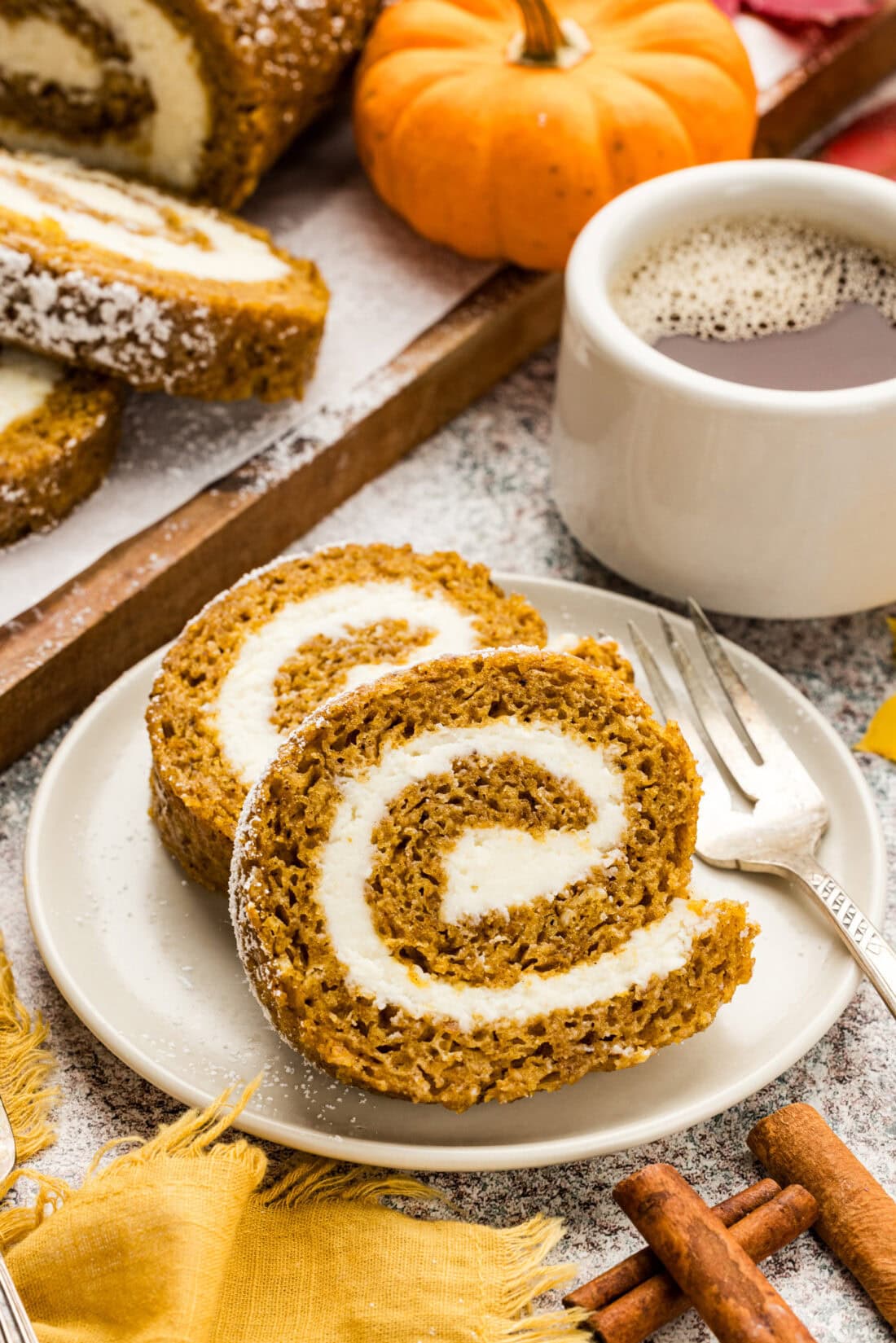 Two slices of Pumpkin Cake Roll on a plate