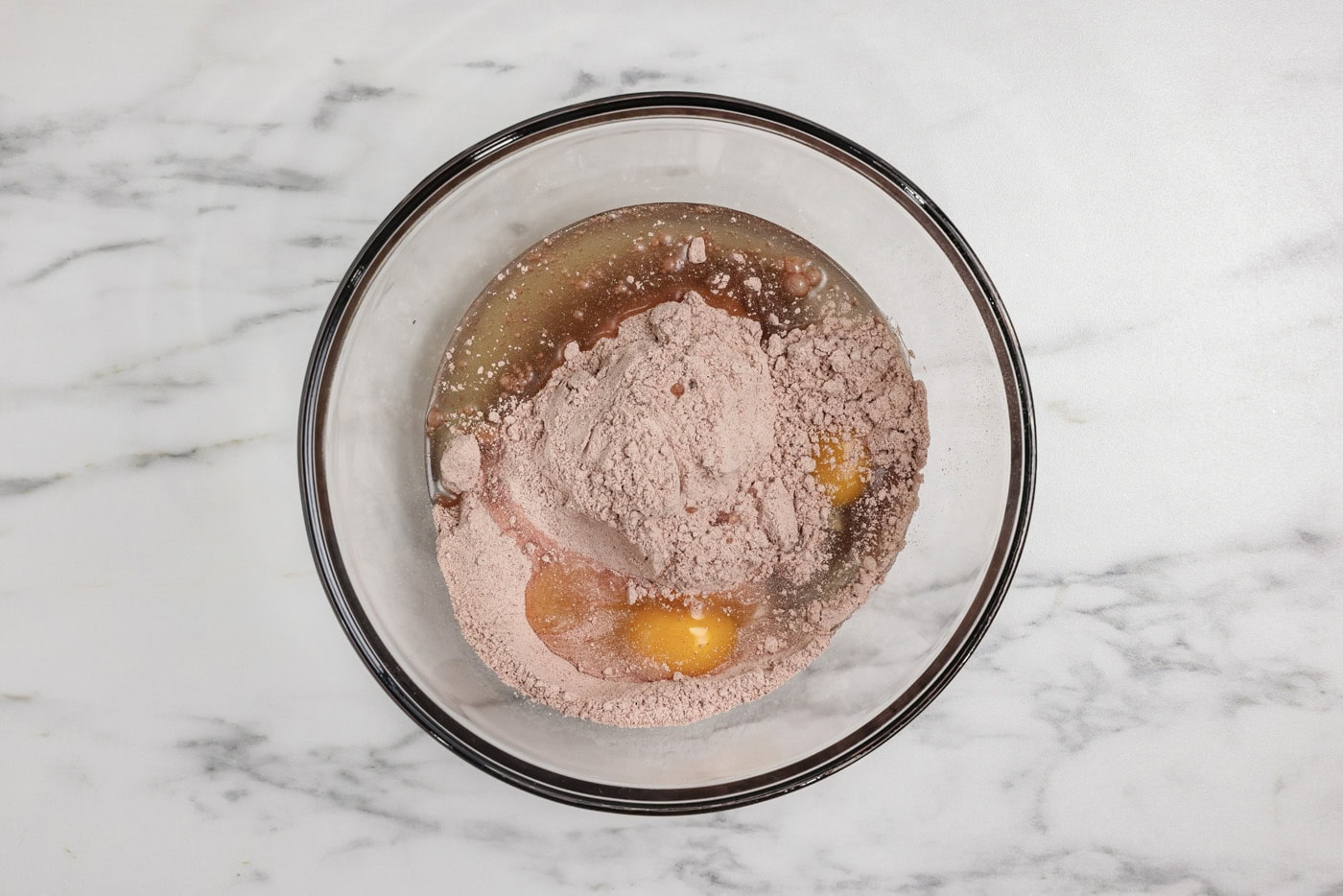cake mix, oil, and eggs in a mixing bowl