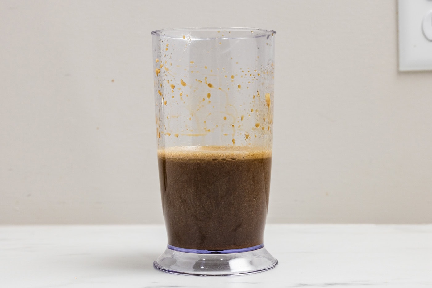 homemade teriyaki sauce blitzed in an immersion blender cup