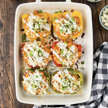 Baking dish of Buffalo Chicken Stuffed Peppers