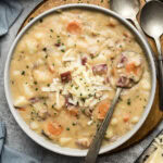 Close up photo of a bowl of Garlic Potato Soup