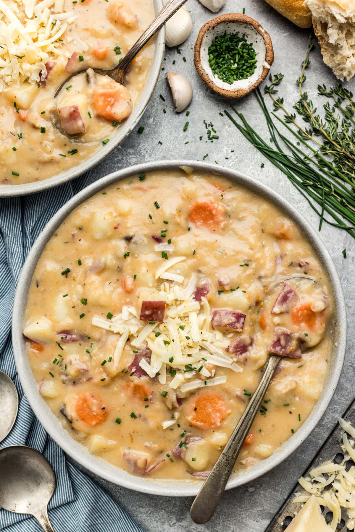 Bowl of Garlic Potato Soup with a spoon in it
