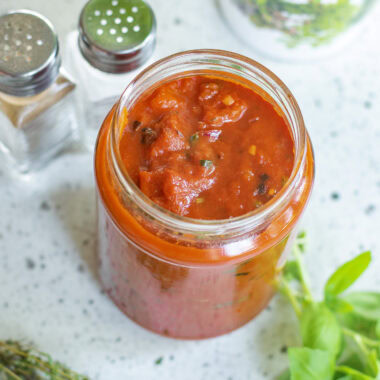 Close up photo of a jar of Marinara Sauce