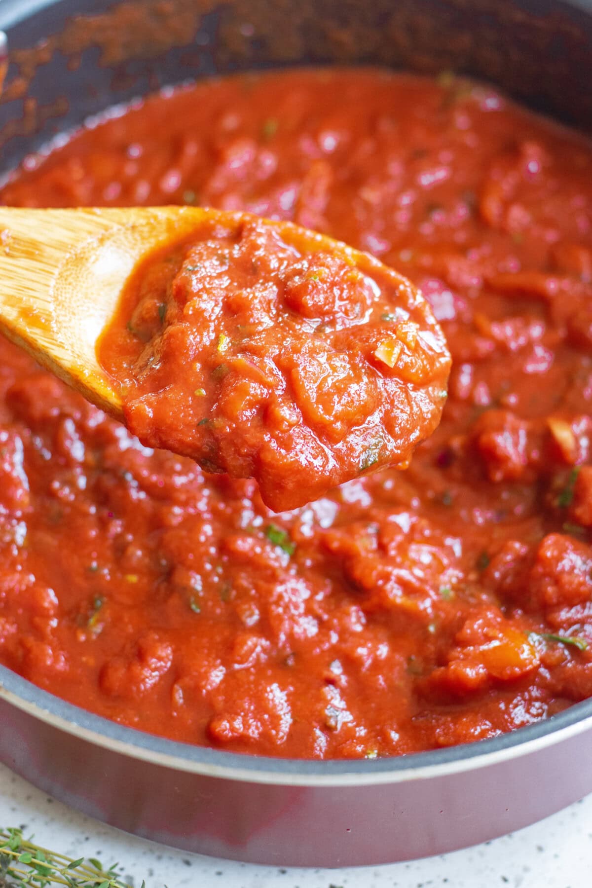 wooden spoonful of marinara sauce