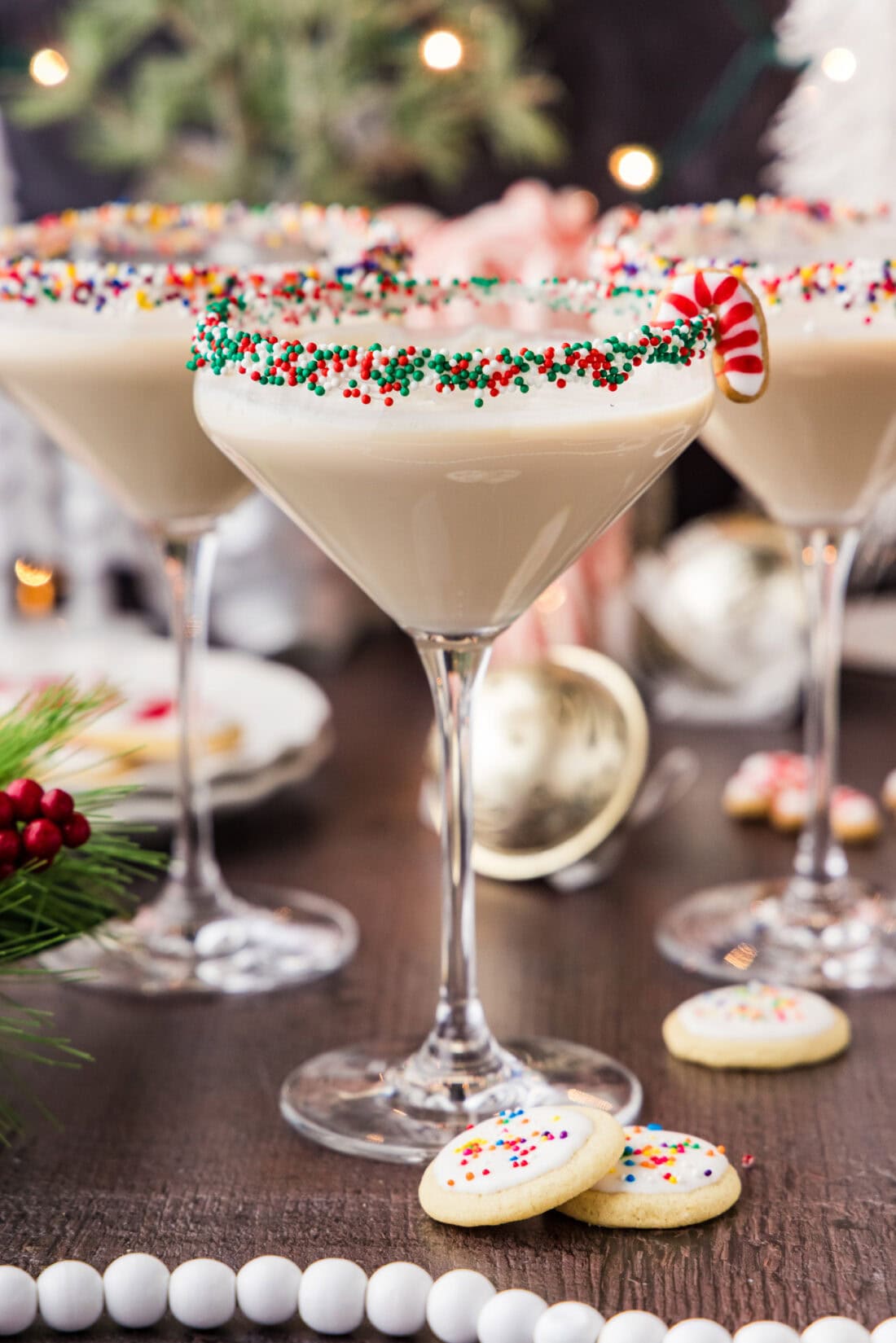 Three Sugar Cookie Martinis with mini sugar cookies next to them