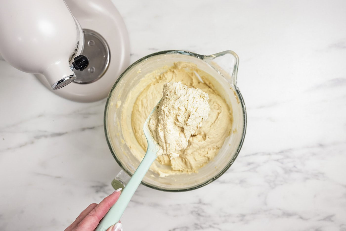 Cookie dough scooped onto a rubber spatula