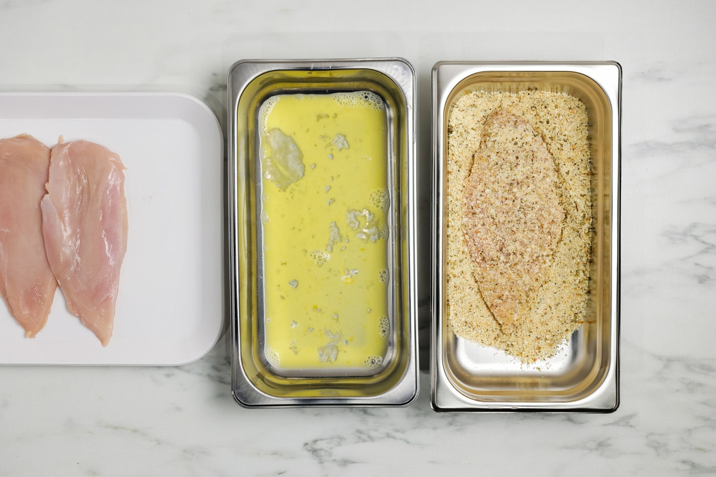 Chicken breast coated in parmesan and breadcrumb mixture