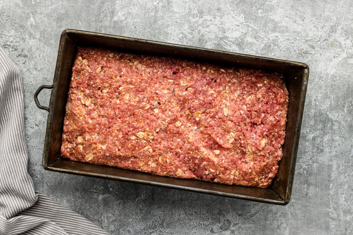 raw meatloaf in a loaf pan