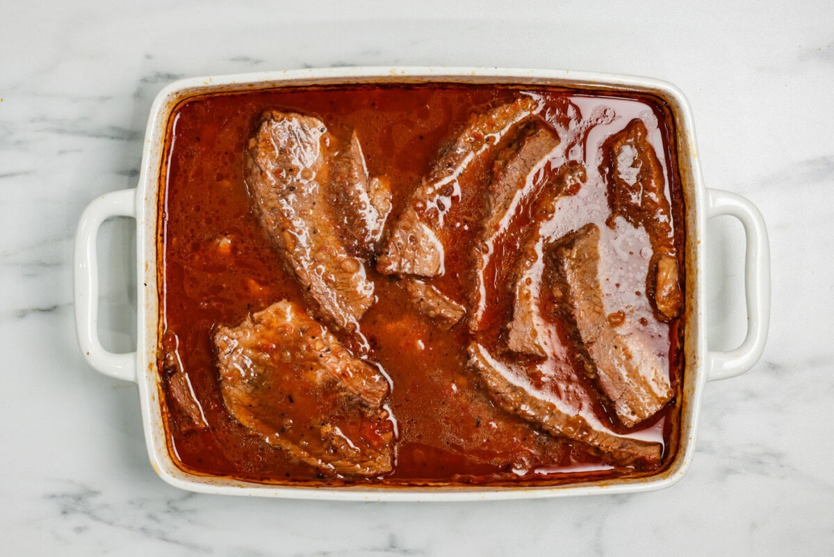 brisket slices nestled into gravy