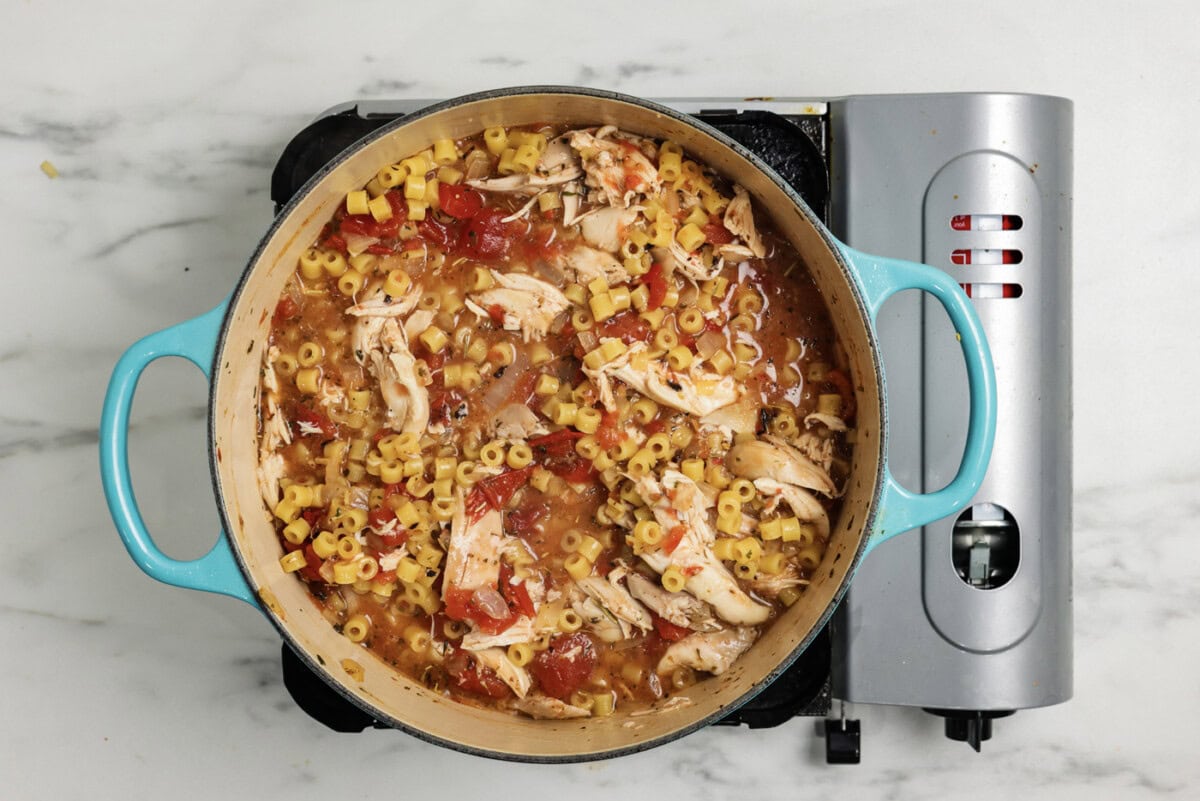 Ditalini pasta added to pot with chicken parmesan soup