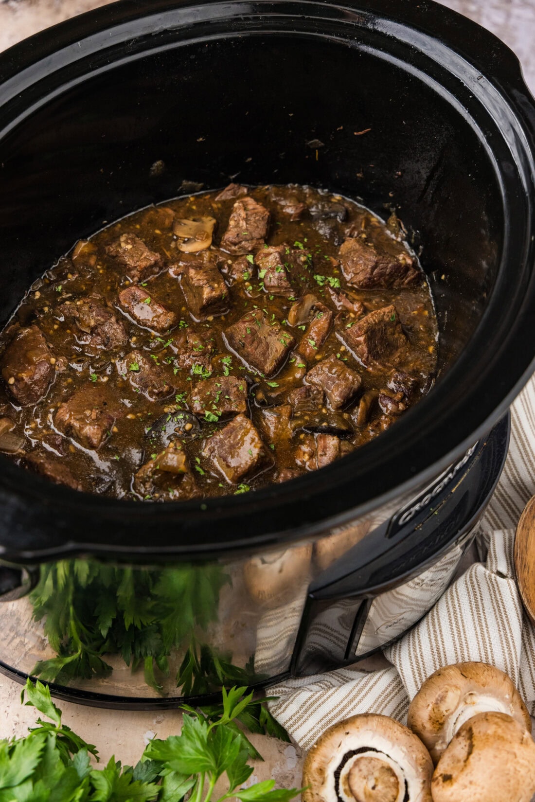 Side photo of Crockpot Beef Tips and Gravy in a Crockpot