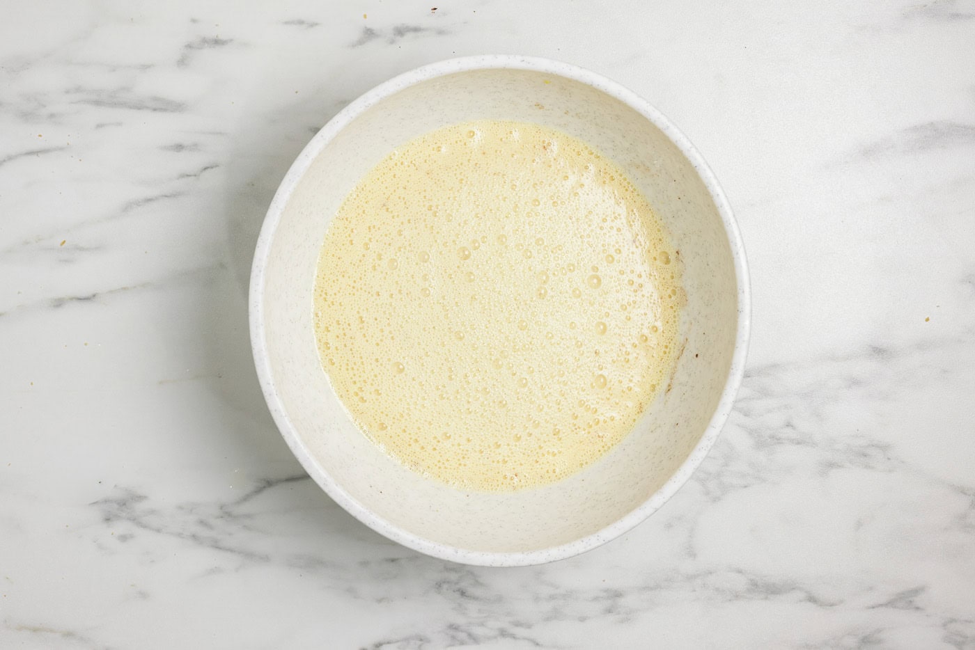 Custard filling in a bowl for french toast casserole