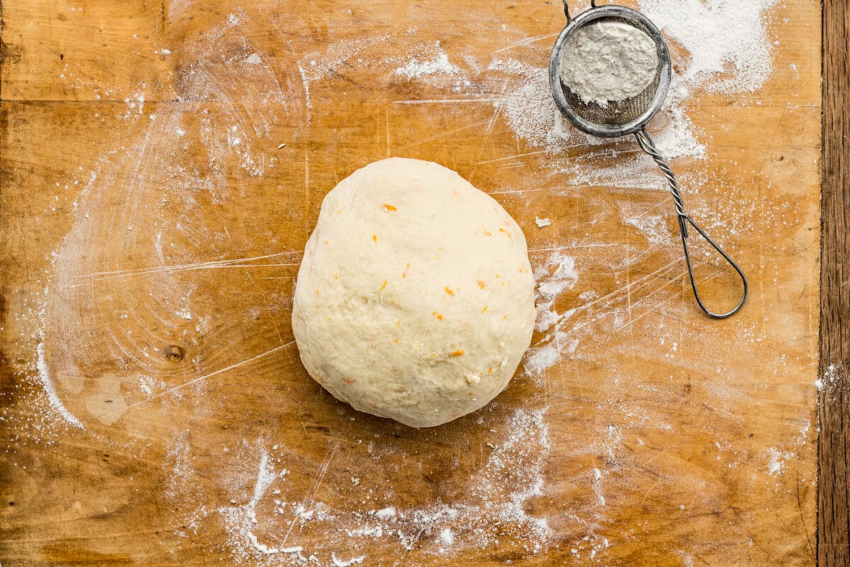 dough ball on a lightly floured surface
