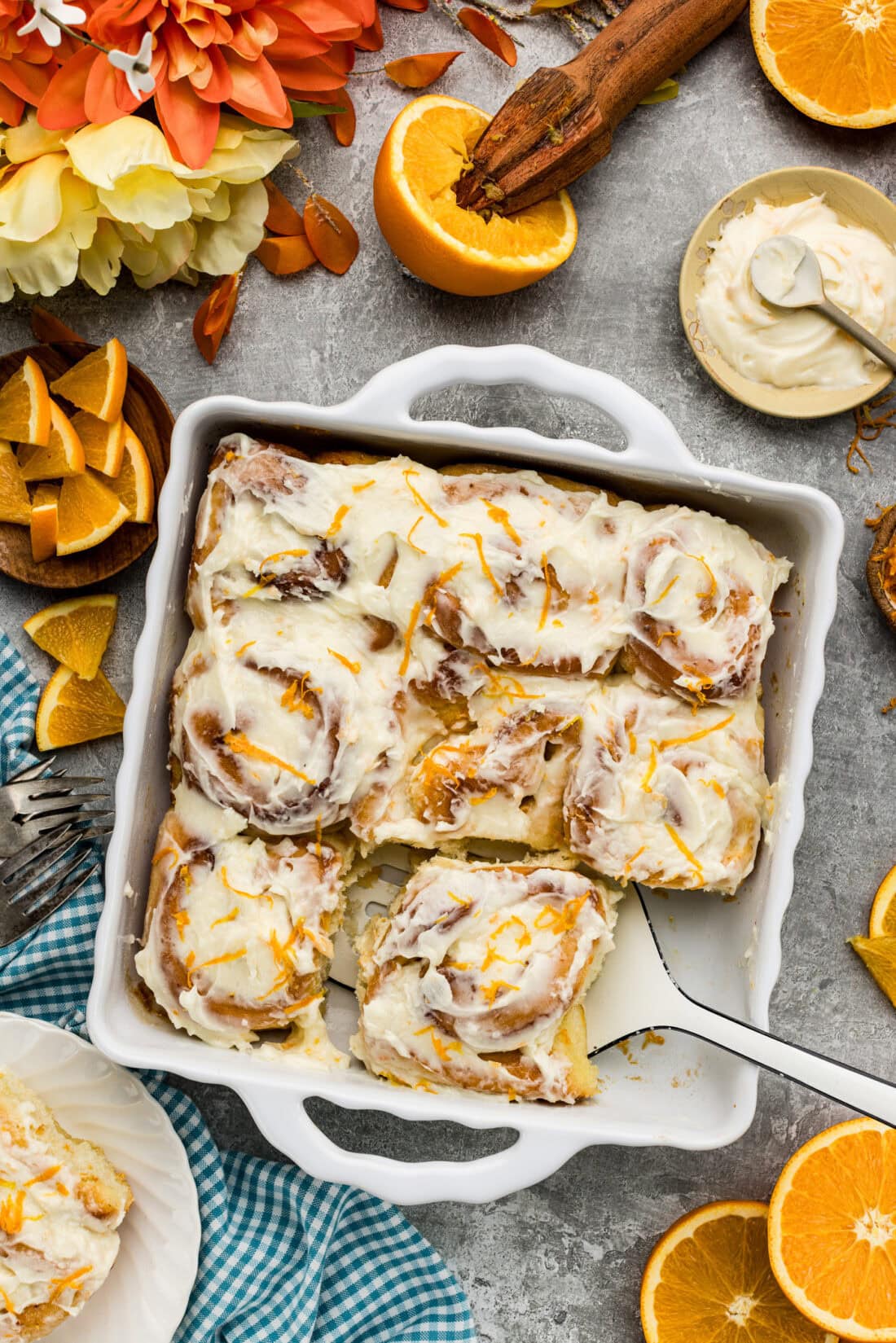 Pan of Quick Orange Rolls with one removed