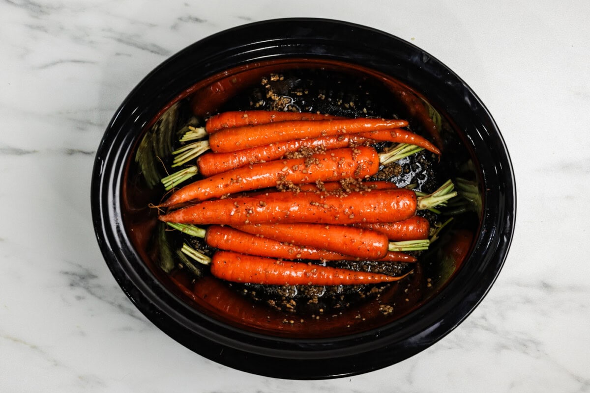 carrots in a slow cooker ready for lid
