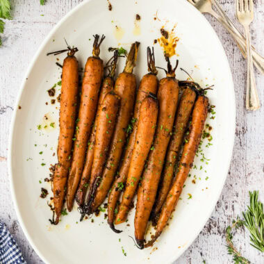 Slow Cooker Balsamic Carrots on a white platter