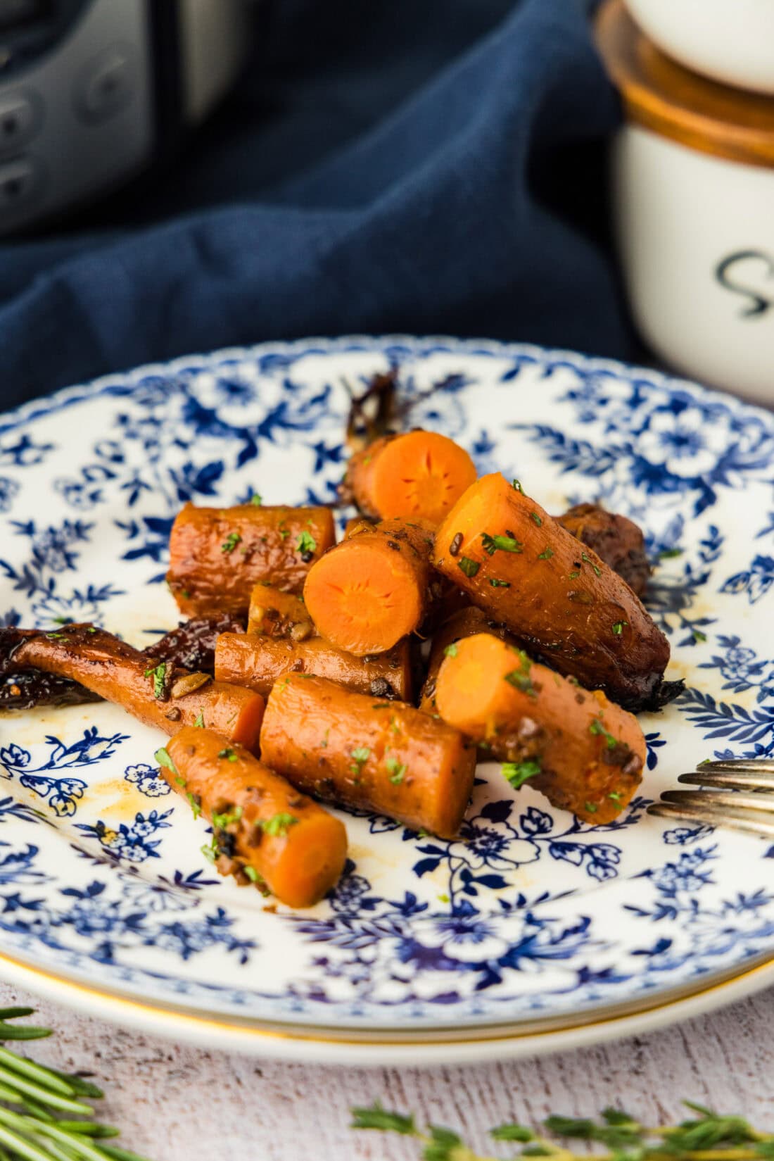 Slow Cooker Balsamic Carrots cut into pieces o a plate