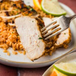 fork holding a piece of Baja Chicken