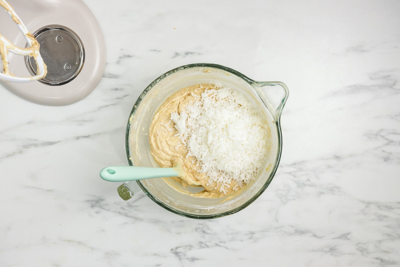 dry ingredients added to cake batter in bol