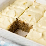 slice removed from Banana Cake with Cream Cheese Frosting