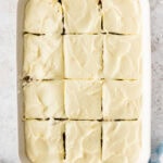 overhead view of sliced Banana Cake with Cream Cheese Frosting
