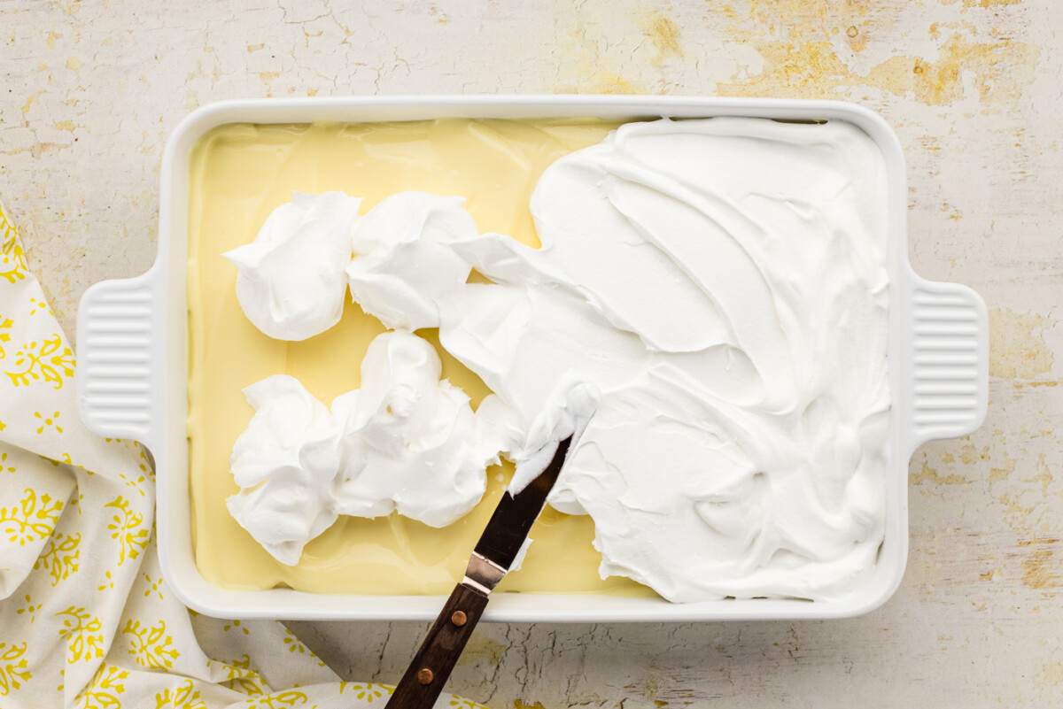 whipped cream spread over dessert